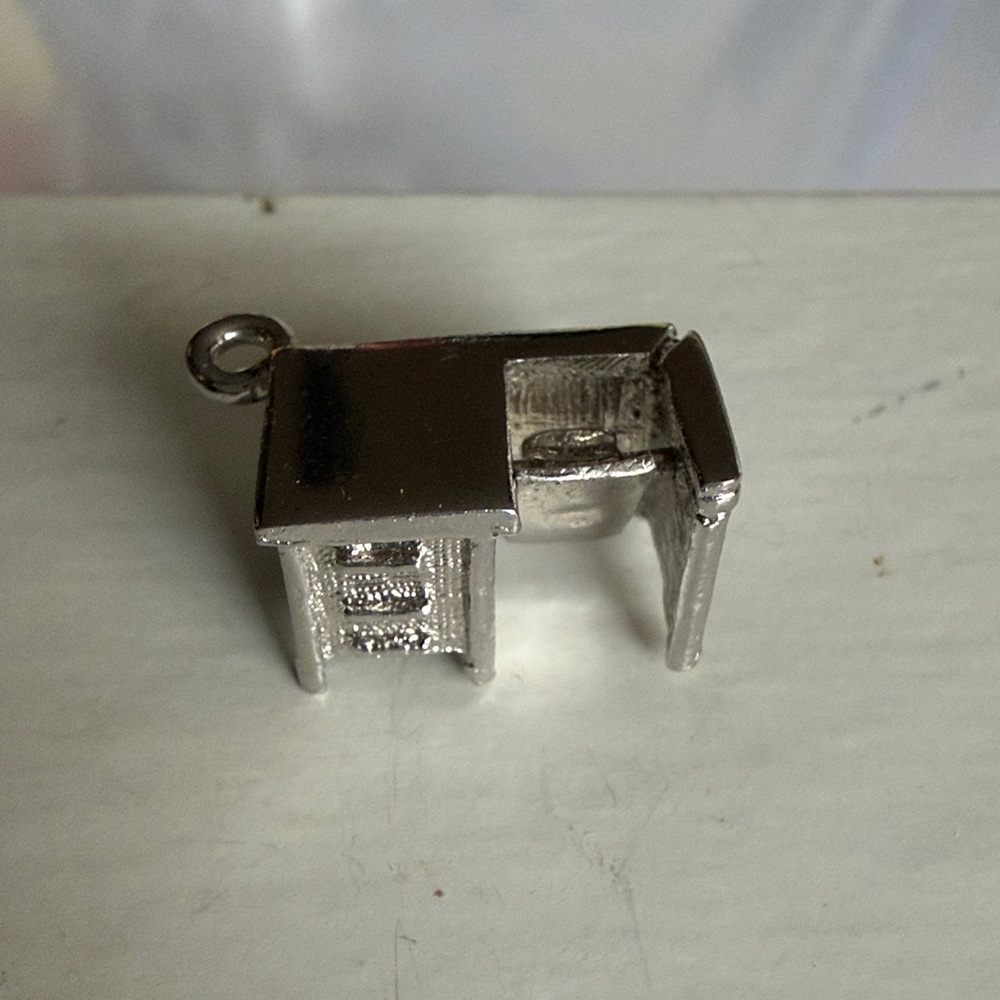 Silver Moving Office Desk Charm With Swivel Typewriter